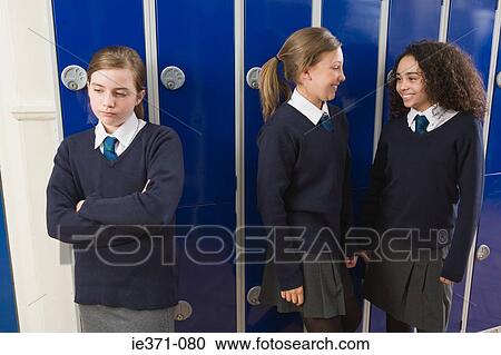 Girl excluded from group View Large Photo Image Stock Image - Girl excluded from group. Fotosearch