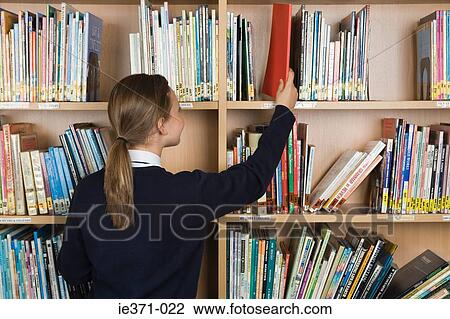 Girl in library View Large Photo Image Stock Image - Girl in library. Fotosearch