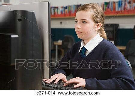 Girl using computer View Large Photo Image Picture - Girl using computer. Fotosearch