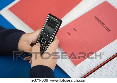 School student with cellphone View Large Photo Image Stock Photograph - School student with cellphone. Fotosearch