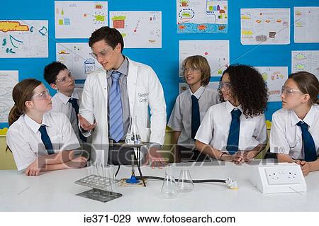 Science teacher and pupils View Large Photo Image Stock Photo - Science teacher and pupils. Fotosearch