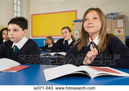 Stock Image - Students in class. Fotosearch
