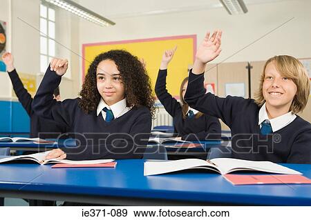 Students with hands raised View Large Photo Image Stock Photo - Students with hands raised. Fotosearch
