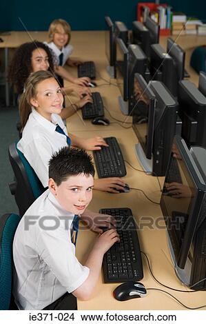 Students working on computers View Large Photo Image Picture - Students working on computers. Fotosearch