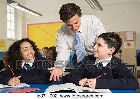 Teacher and pupils View Large Photo Image Stock Image - Teacher and pupils. Fotosearch