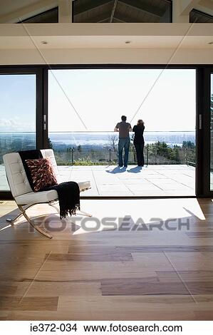 Picture - Couple on balcony. Fotosearch