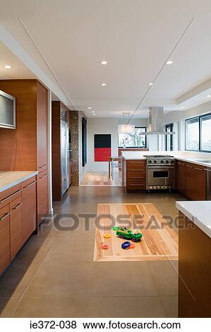 Toys on kitchen floor View Large Photo Image Stock Photo - Toys on kitchen floor. Fotosearch