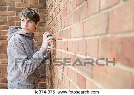 Boy doing graffiti View Large Photo Image Stock Photography - Boy doing graffiti. Fotosearch