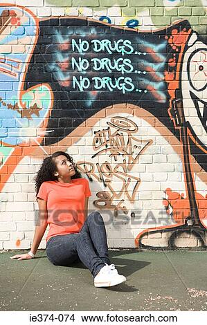 Girl looking at graffiti View Large Photo Image Picture - Girl looking at graffiti. Fotosearch