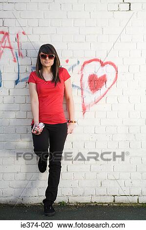 Stock Image - Girl with graffiti. Fotosearch