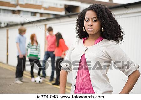 Teenagers by garages View Large Photo Image Stock Image - Teenagers by garages. Fotosearch