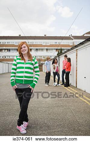Teenagers by garages View Large Photo Image Stock Image - Teenagers by garages. Fotosearch