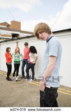 Teenagers by garages View Large Photo Image Stock Photo - Teenagers by garages. Fotosearch