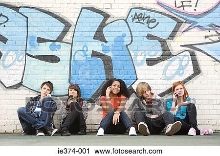 Teenagers on cellphones View Large Photo Image Stock Image - Teenagers on cellphones. Fotosearch