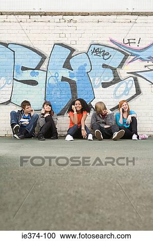 Teens on cellphones View Large Photo Image Stock Image - Teens on cellphones. Fotosearch