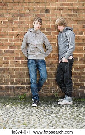 Two teenage boys View Large Photo Image Stock Image - Two teenage boys. Fotosearch