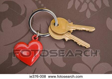 Keys on keyring with heart View Large Photo Image Stock Photo - Keys on keyring with heart. Fotosearch