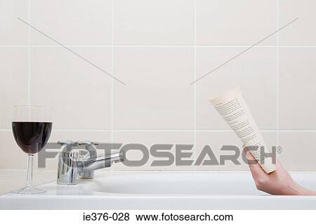 Person in bath with wine View Large Photo Image Stock Photo - Person in bath with wine. Fotosearch