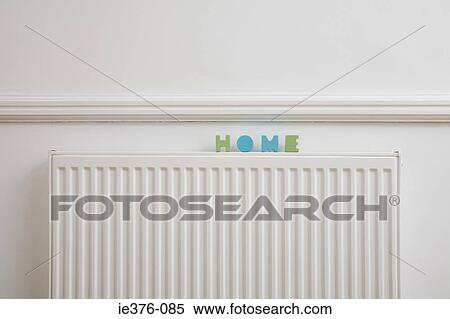Stock Photography - The word home on a radiator. Fotosearch
