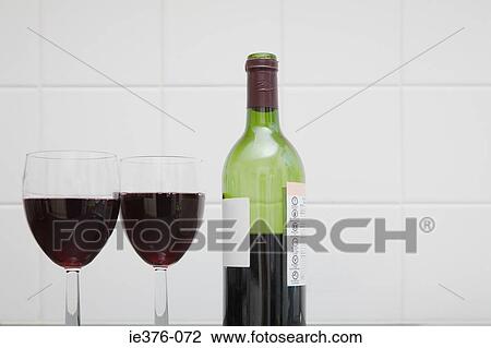 Stock Image - Wine bottle and glasses. Fotosearch