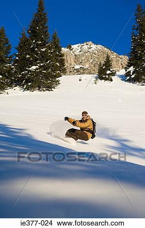 A man snowboarding View Large Photo Image Picture - A man snowboarding. Fotosearch