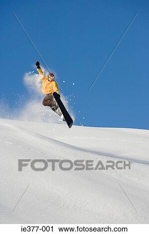 A man snowboarding View Large Photo Image Stock Image - A man snowboarding. Fotosearch