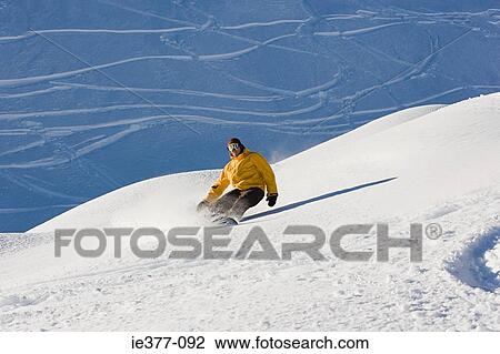 A man snowboarding View Large Photo Image Stock Image - A man snowboarding. Fotosearch