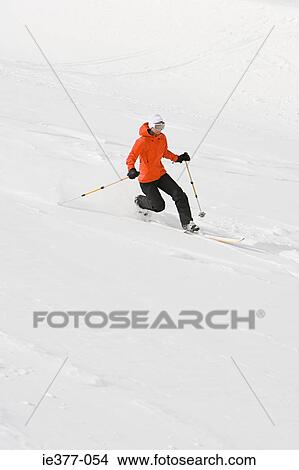 A woman skiing View Large Photo Image Picture - A woman skiing. Fotosearch