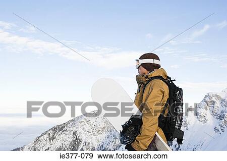 Profile of a snowboarder View Large Photo Image Stock Photo - Profile of a snowboarder. Fotosearch
