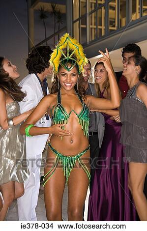 Picture - Dancer in costume at a party. Fotosearch
