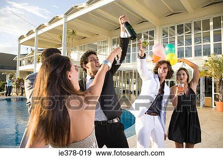 People having a pool party View Large Photo Image Stock Photo - People having a pool party. Fotosearch