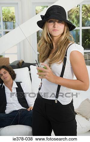 Stylish woman drinking a mojito View Large Photo Image Stock Photo - Stylish woman drinking a mojito. Fotosearch