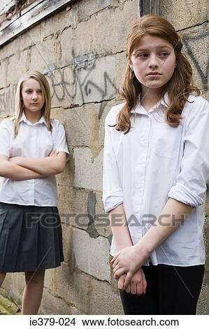 A girl being bullied View Large Photo Image Picture - A girl being bullied. Fotosearch