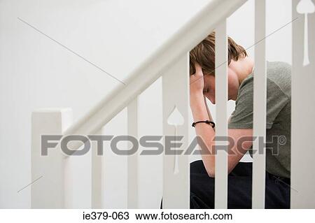 A teenage boy crying View Large Photo Image Stock Image - A teenage boy crying. Fotosearch