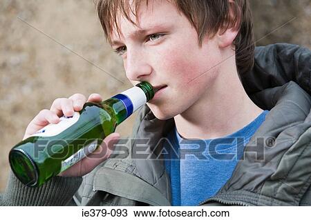 A teenage boy drinking beer View Large Photo Image Stock Image - A teenage boy drinking beer. Fotosearch