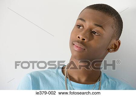 A teenage boy thinking View Large Photo Image Stock Image - A teenage boy thinking. Fotosearch