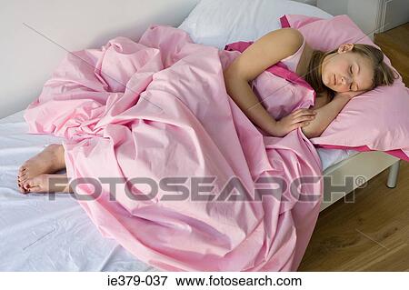 A teenage girl sleeping View Large Photo Image Stock Photo - A teenage girl sleeping . Fotosearch