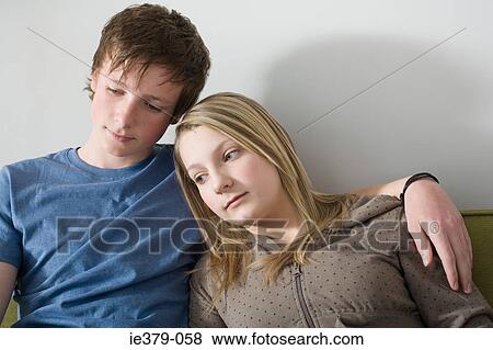 Stock Photo - A young couple thinking. Fotosearch