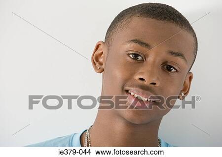 Portrait of a teenage boy View Large Photo Image Picture - Portrait of a teenage boy. Fotosearch