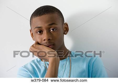Portrait of a teenage boy View Large Photo Image Picture - Portrait of a teenage boy. Fotosearch
