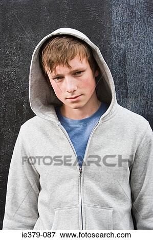 Stock Photo - Portrait of a teenage boy. Fotosearch