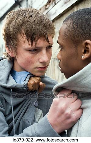 Teenage boys fighting View Large Photo Image Stock Image - Teenage boys fighting. Fotosearch