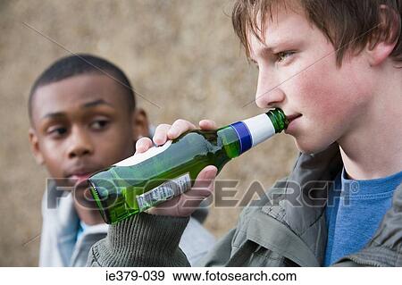 Teenagers drinking beer View Large Photo Image Stock Photo - Teenagers drinking beer. Fotosearch