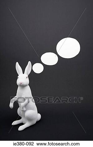 Stock Image - Speech bubbles coming from a rabbit. Fotosearch