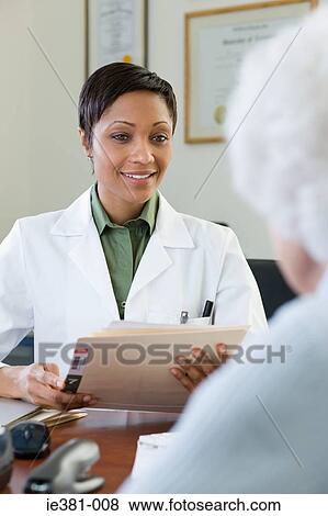 A doctor and patient View Large Photo Image Stock Photo - A doctor and patient. Fotosearch