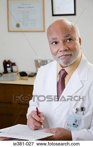 A doctor thinking View Large Photo Image Stock Photo - A doctor thinking. Fotosearch