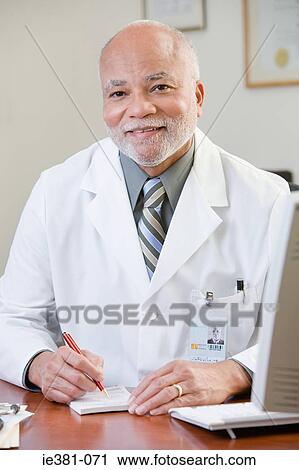 Portrait of a male doctor View Large Photo Image Stock Image - Portrait of a male doctor. Fotosearch