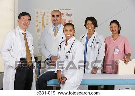 Portrait of doctors and a nurse View Large Photo Image Stock Photo - Portrait of doctors and a nurse. Fotosearch