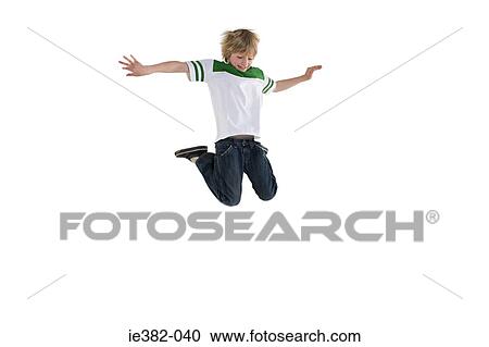 A boy jumping View Large Photo Image Stock Image - A boy jumping. Fotosearch