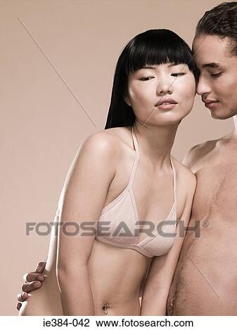 Intimate young couple View Large Photo Image Stock Image - Intimate young couple. Fotosearch